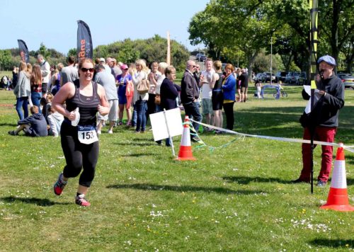 Karen Beaton crossing the line. Credit John Dempsey, Montrose Images